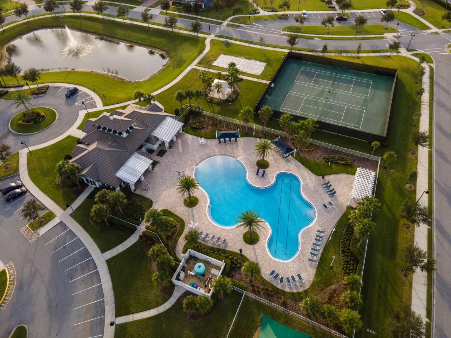 Aerial view of the Hickory Hammock clubhouse, resort-style pool and tennis courts