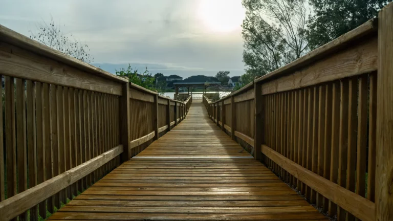 Wooden boardwalk leading to the Hickory Hammock community pier