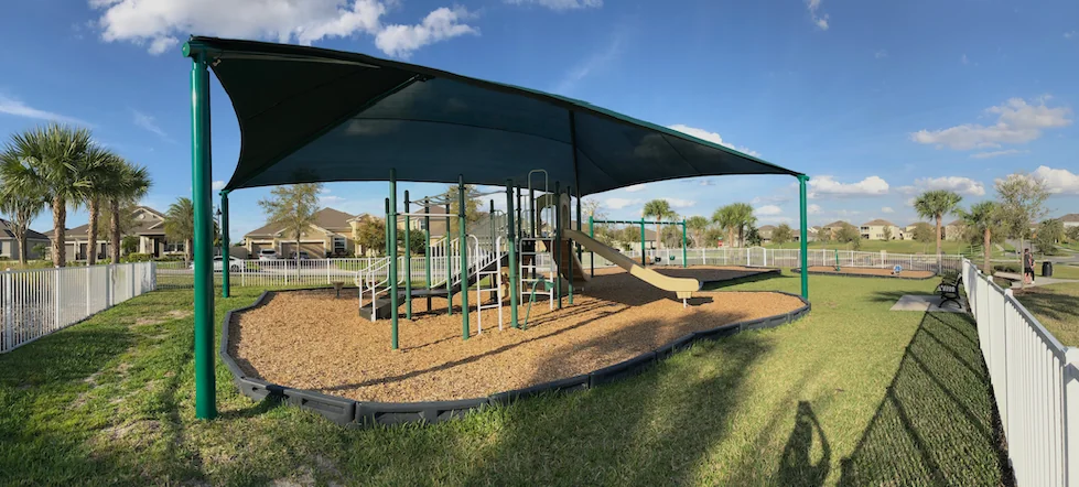 Shaded playground at Hickory Hammock