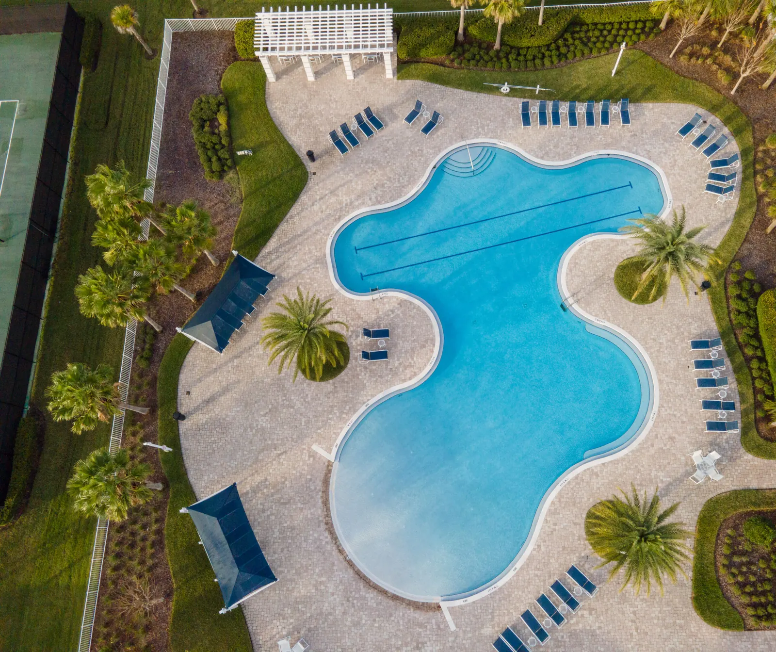 Aerial view of the resort-style pool and lounge chairs at Hickory Hammock