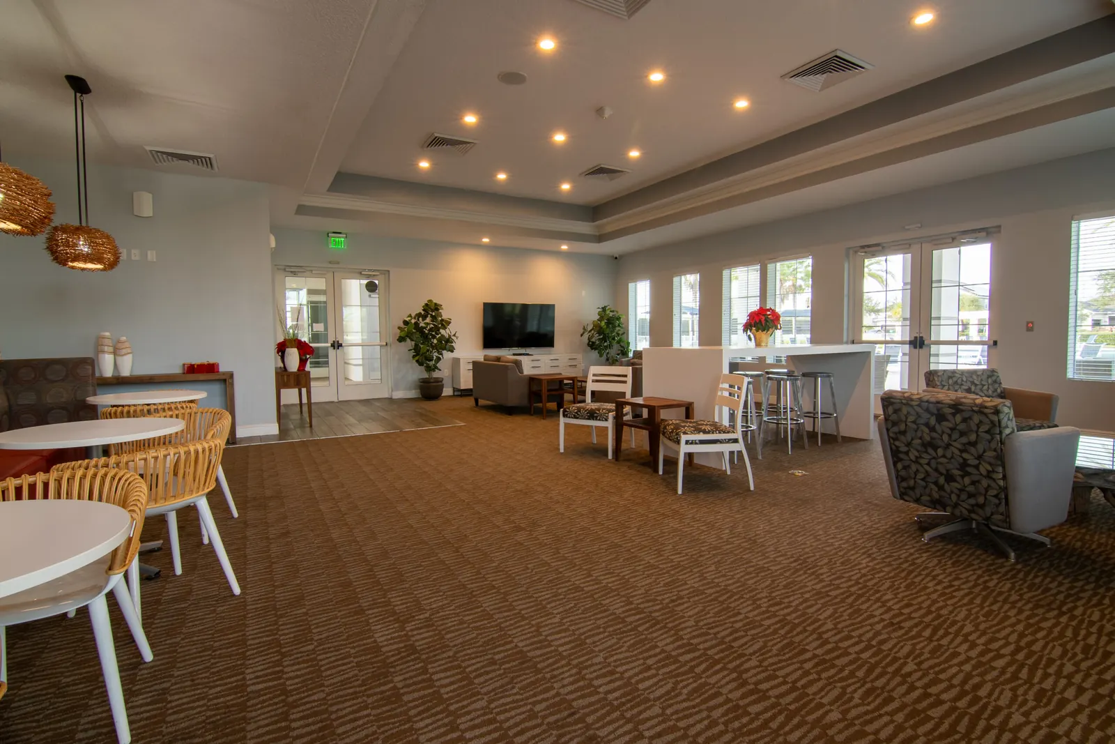 Hickory Hammock clubhouse event space with cafe tables