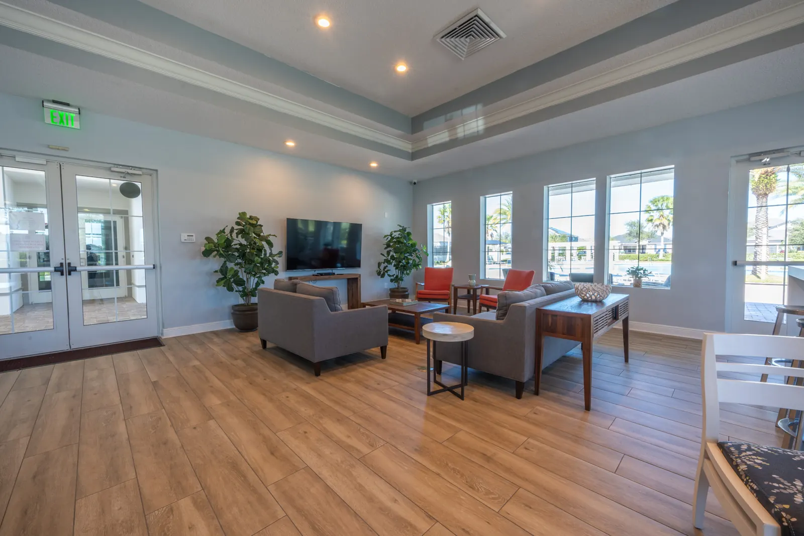 Hickory Hammock clubhouse great room with sofas and a TV