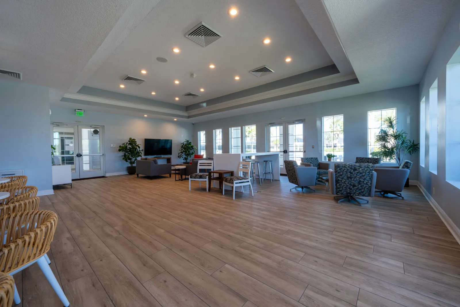 Open clubhouse room at Hickory Hammock with windows on three sides