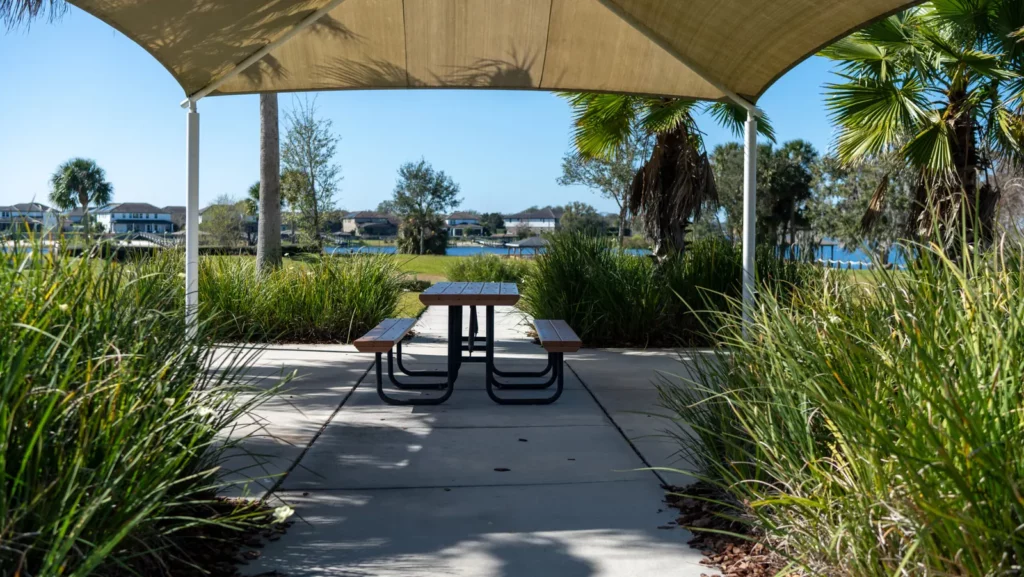Covered picnic area with tables at Hickory Hammock